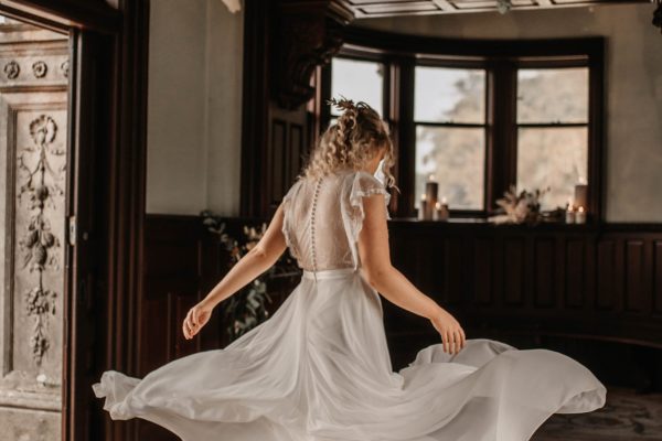 A bride twirling her dress